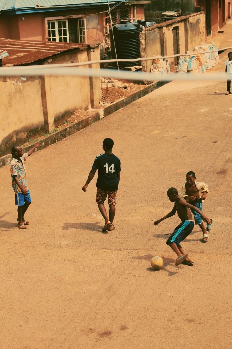 Children enjoying a game of football